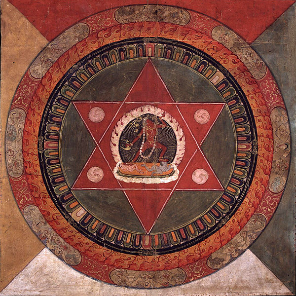 600px-Painted_19th_century_Tibetan_mandala_of_the_Naropa_tradition,_Vajrayogini_stands_in_the_center_of_two_crossed_red_triangles,_Rubin_Museum_of_Art