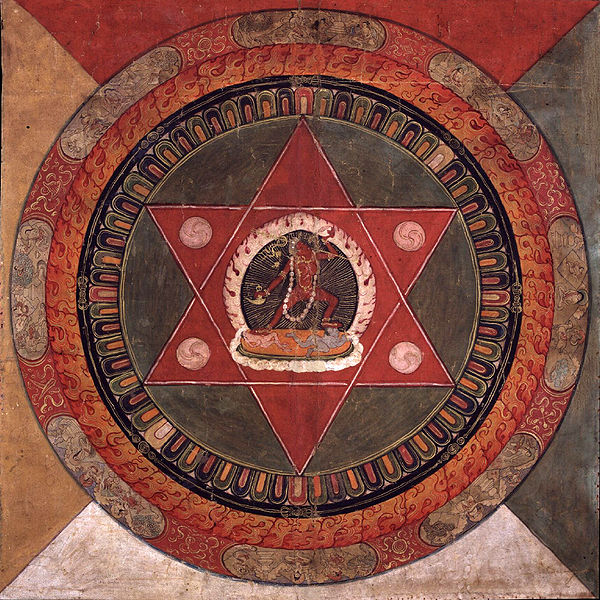 600px-Painted_19th_century_Tibetan_mandala_of_the_Naropa_tradition,_Vajrayogini_stands_in_the_center_of_two_crossed_red_triangles,_Rubin_Museum_of_Art